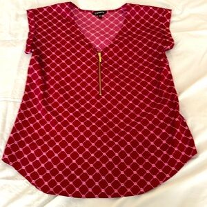 Casual Office Wear. 96% polyester 4% spandex. Zip detail on front.